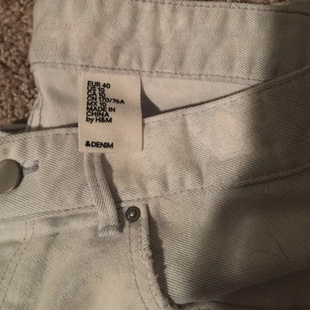 H&M cut off shorts with‎ a lace print design